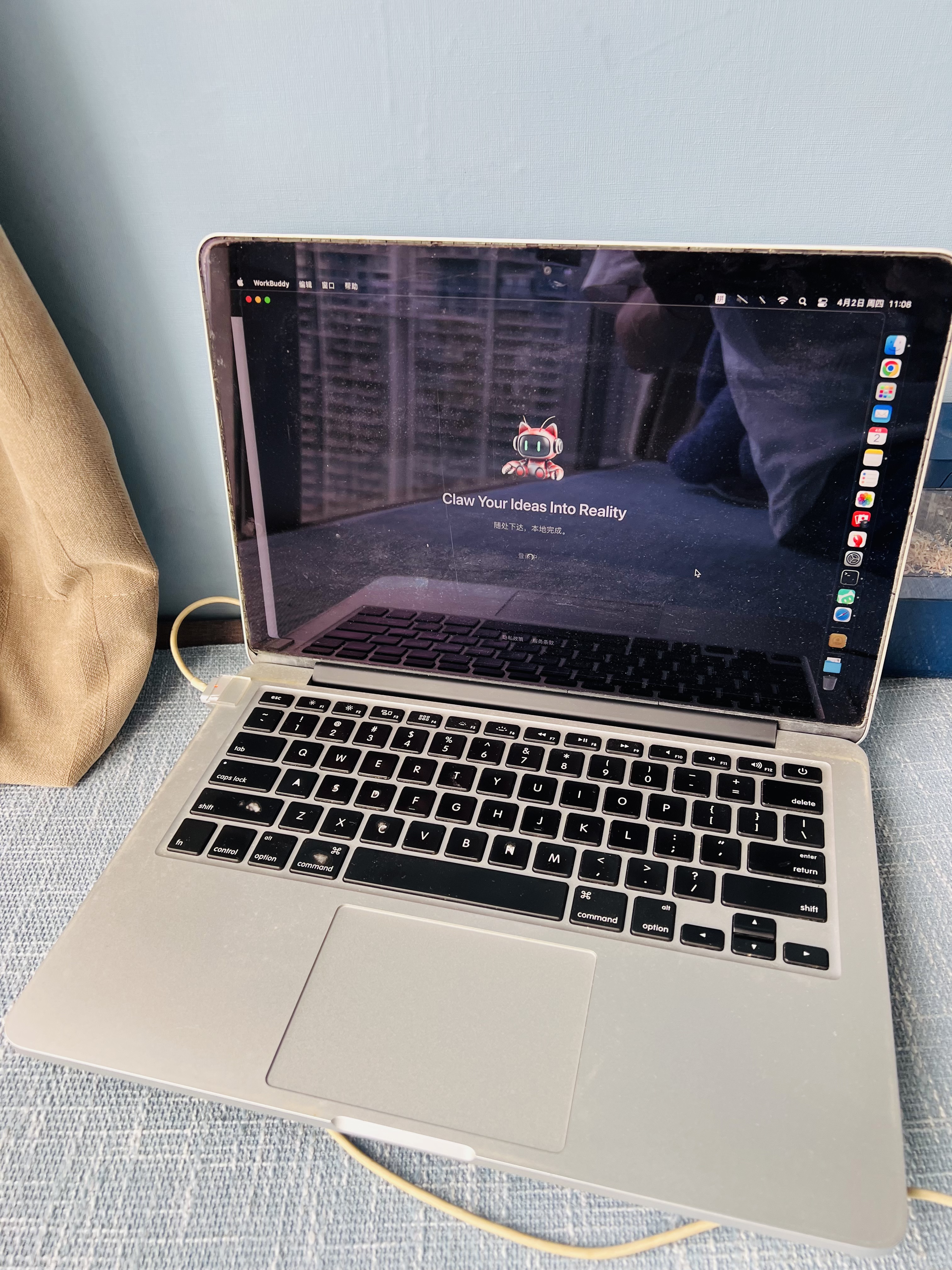 MacBook Pro screen showing Claw Your Ideas Into Reality login page